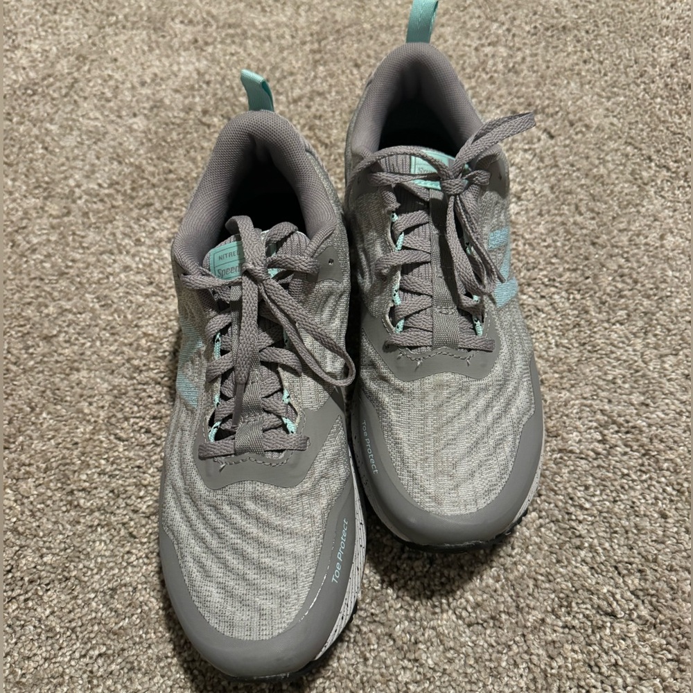 New Balance trail running shoe, new condition, size 8.5